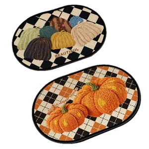 Oval linen-texture bath mats with faux embroidery pumpkin and checkerboard designs