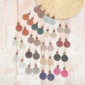 Boucles d'oreilles pendantes vintage en cuir et bois ajourées en plusieurs coloris