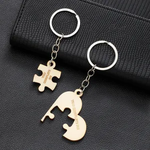 Handcrafted wooden puzzle and heart keychain set with YOU COMPLETE ME engraving details