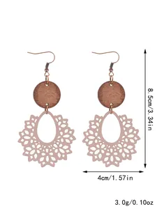 Detailed view of Bohemian hollowed-out lace earrings with wood discs and dimensions