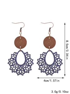 Close-up of Bohemian hollow earrings with blue floral wood cutout and dimensions.