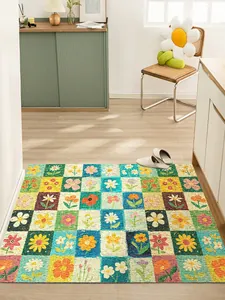 Detailed view of colorful floral square pattern on a non-slip PVC coil entrance mat