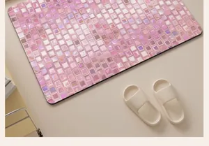 Macro view of a pink mosaic pattern absorbent diatomaceous earth bath mat for bathrooms