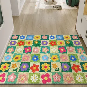 Colorful floral pattern PVC door mat with anti-slip silk loop texture for home decor.