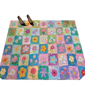 Colorful floral PVC silk loop door mat with anti-slip texture for home entry.