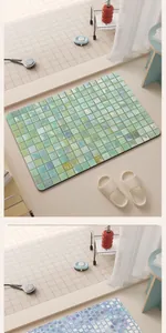 Detail view of colorful mosaic tile pattern on absorbent bathroom diatom mud floor mat