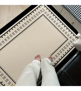 Paillasson d'entrée en TPR de luxe avec une bordure géométrique noire moderne et élégante