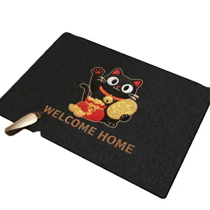 Paillasson noir durable en velours bouclé avec chat porte-bonheur brodé et texte