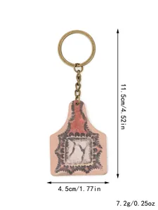 Western farm style wooden keychain detail showing 11.5cm length and cow tag shape