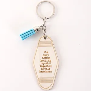 Porte-clés humoristique en bois gravé avec un joli pompon bleu clair style hôtel