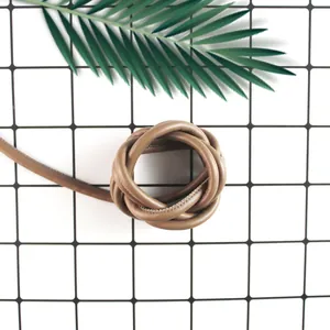 Close-up of durable round stitched PU leather cord for DIY bag weaving and phone chains