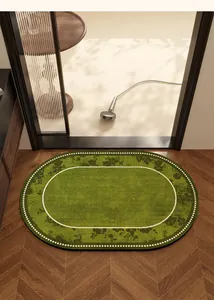 Green floral oval diatom mud bath mat placed on a wooden floor in a luxury bathroom