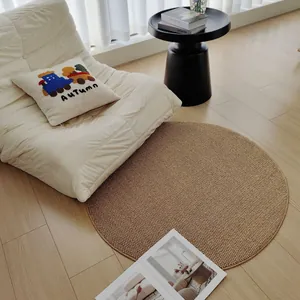 Tapis rond moderne marron aspect sisal pour salon avec décoration intérieure chaleureuse