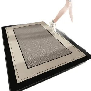 Paillasson d'entrée premium en velours bouclé TPR au design géométrique et bordure noire
