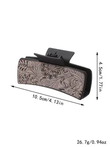 Pince à cheveux style Western avec motif floral, dimensions 10,5 cm x 4,5 cm sur blanc