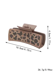 Pince à cheveux léopard en cuir, dimensions 10,5 cm par 4,5 cm et poids de 26,7 g