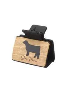 Western-style hair claw clip featuring a cow silhouette and Show Mama text detail
