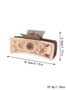 Vue détaillée de la pince à cheveux en cuir imprimé tournesol avec les dimensions