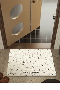Tappeto da bagno assorbente in diatomite con motivo a spruzzi e Tiny Pleasures.
