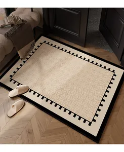 Luxury loop pile entry floor mat featuring a modern black geometric border design