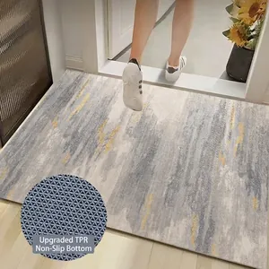 Tappetino d'ingresso antiscivolo in TPR grigio e oro con trama a riccio resistente