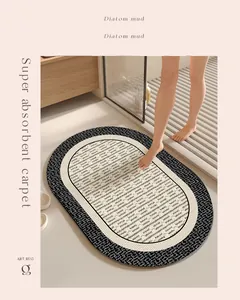 Tappeto da bagno ovale in terra di diatomee con motivo a intreccio bianco e nero