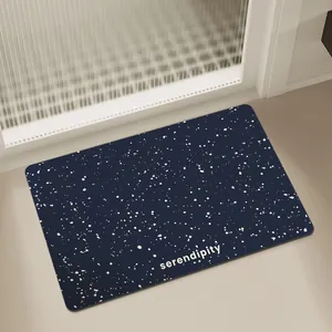 Tappetino bagno assorbente in terra di diatomee blu scuro con motivo a stelle e testo