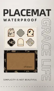 Detailed display of vintage French luxury waterproof leather placemats with elegant bird motifs