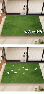 Detailed close-up of green absorbent diatomaceous earth mats with cute panda and bird designs