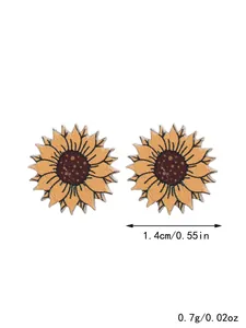Detailed macro view of sunflower wooden stud earrings with size and weight markers