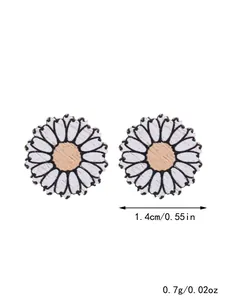 Detail of wooden daisy stud earrings showing 1.4cm diameter and lightweight 0.7g design