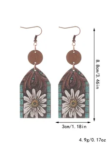 Western style wooden dangle earrings with daisy floral print and measurement details.