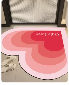 Close-up of heart-shaped absorbent leather rug with gradient pink design