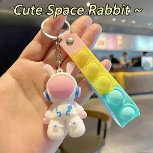 Cute astronaut rabbit keychain with colorful fidget pop silicone strap for bag pendant