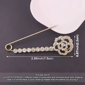 Elegant metal flower rhinestone brooch pin for clothing waist adjustment and anti-exposure