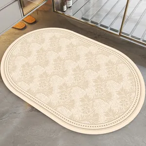 Detailed view of oval American style bath mat with elegant beige floral pattern