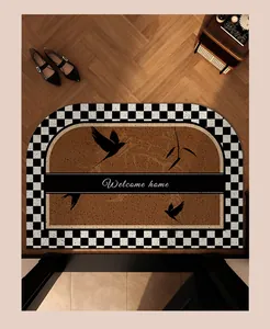 Paillasson vintage demi-rond avec texte Welcome home et silhouettes d'oiseaux.