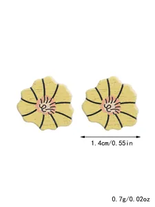 Detailed view of yellow wooden sunflower stud earrings with 1.4cm size annotation