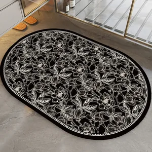 Macro detail of a vintage oval black and white floral absorbent bath mat in a modern bathroom