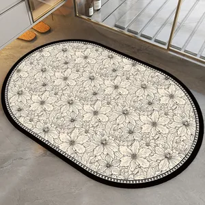 Oval American style bathroom mat with black floral pattern and non-slip border