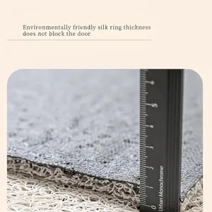 Close-up of durable dark grey silk ring door mat showing 1cm thickness and texture
