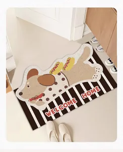 Paillasson chien teckel avec texte Welcome Home dans une entrée de maison de cosy