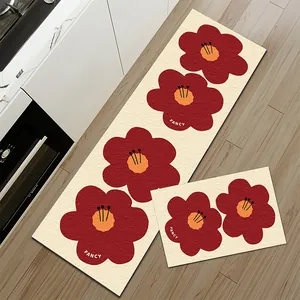 Moderne keukenmatten set met rode bloemen, absorberend en antislip op houten vloer