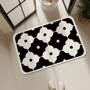 Moderne rutschfeste Badematte mit schwarz-weißem Blumenmuster für Bad und Eingang