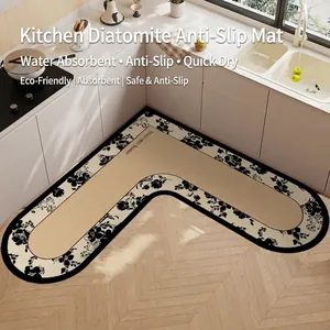 Alfombra de cocina en forma de L de tierra de diatomeas con borde floral negro y texto Welcome