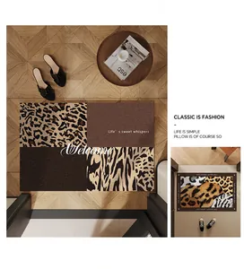 Detailed view of animal print entryway mat featuring leopard and zebra patterns design
