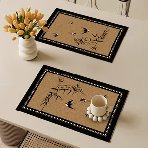 Exklusives Set französischer Leder-Platzsets mit feinen Vogel- und Bambusmustern