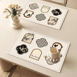 Vintage style waterproof leather placemats with elegant bird and bamboo patterns