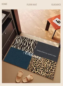 Modern leopard and zebra print entry door mat with Welcome text for luxury home decor