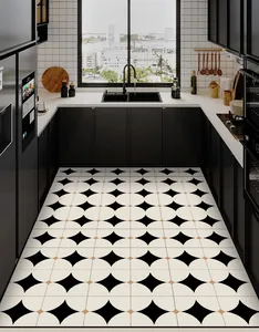 Modern black and white geometric PVC kitchen floor mat in a stylish home setting